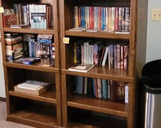 Books, four book cases, two with doors.  