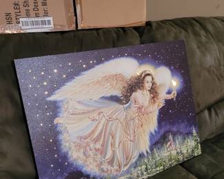 Battery operated, light-up angel wall art.