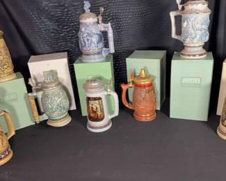 Eight Avon Beer Steins 