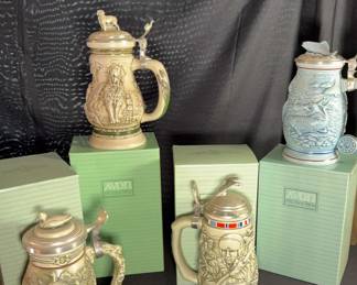 Variety of Avon Beer steins 