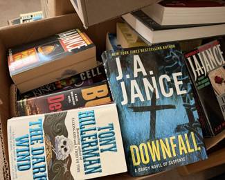 Paperback fiction books.