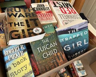 Paperback fiction books.