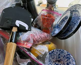 Camping gear, including lanterns, shovels, axes, stoves + dishware