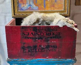 Original artwork by Annie Peterson; carved wooden cabinet