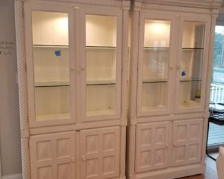 Two glass front lighted cabinets by Lexington Furniture 