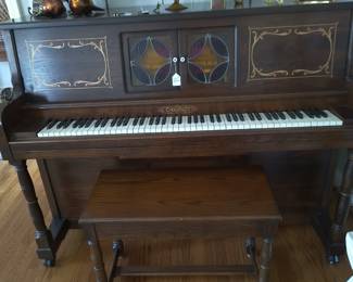 Player piano with rolls