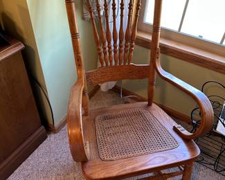 This excellent pressed back rocker with a rattan seat is, you guessed it, IN EXCELLENT CONDITION! Are you seeing a theme yet? 