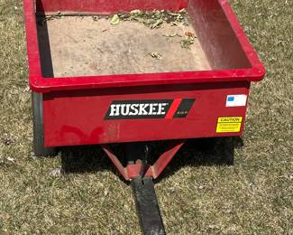 A very well maintained HUSKEE Lawn Trailer! Perfect to haul behind your riding mower! 