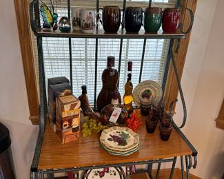 The kitchen and dining room are STUFFED worth great vintage and modern usable items! This bakers rack is overflowing with terrific treasures!
