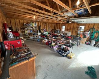 The BACK garage is STUFFED! Tools, clamping, lawn, car supplies, you name it, we got it! 