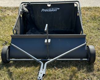 Precision Lawn Sweeper! Leaves and grass clippings are no match for this thing! 
