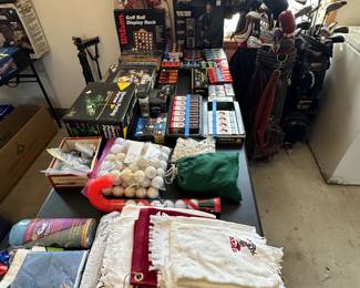 This ENTRE table is filled with golf balls and accessories! 