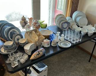 The loving room has lots of treasures too!  This 8ft banquet table is filled with lots of vintage china and glassware! 