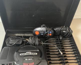 Lot 337 | Vintage Sega Genesis Game Console w Remotes
