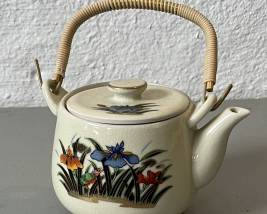 Lot 347 | Vintage Asian Teapot w Straw Wrapped Handle
