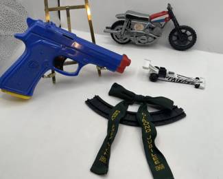 Lot 219 | Vintage Toy Mixed Lot Kewpie Dolls, Water Pistol,
