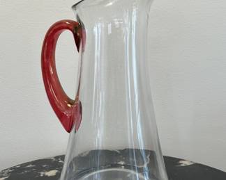Lot 34 | 1970s Red Glass Handled Cocktail Pitcher
