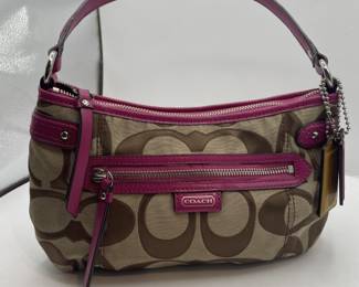 Lot 141 | Coach Leather Trimmed Canvas Monogram Purse
