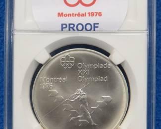 Lot 257. 1976 Montreal Olympics $5.00 sterling silver proof coin. 24.0 grams.