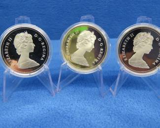 Lot 230. Three 1984 Canadian Proof Silver Dollar each coin has 11.5 grams of fine silver