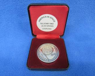 Lot 105. 1962 NASA America in Space sterling silver medallion depicting Telstar. 26.40 grams.