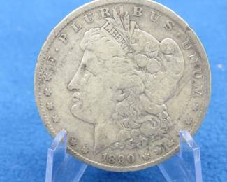 Lot 12. 1890 O Morgan Silver Dollar