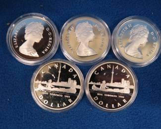 Lot 95. Five 1984 Canadian proof silver dollars. Each coin contains 11.65 grams of pure silver. Total of 58.25 grams of silver.