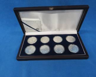 Lot 209. Silver Dollar Presentation case with 12 silver coins, including 1921 P Peace silver dollar, 1921 P Morgan silver dollar, and more.