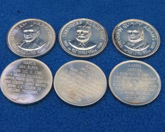 Lot 378. Six Franklin Mint First Edition Presidential Mini coins weighing a total of 46.5 grams.