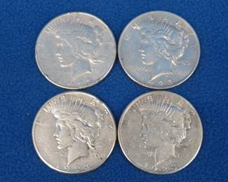 Lot 361. Four 1923 Peace silver dollars. P, and three S's.
