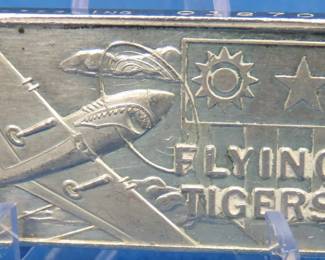 Lot 115. Flying Tigers commemorative sterling silver ingot weighing 44 grams