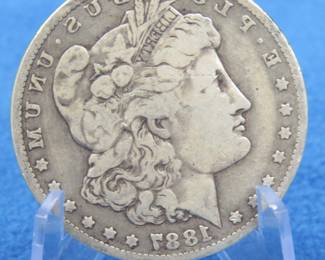 Lot 64. 1887 O Morgan Silver Dollar