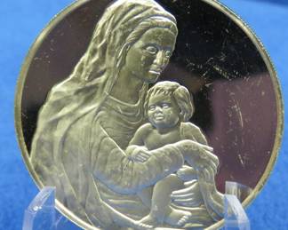 Lot 86. Postmasters of America 1975 Mary and Jesus 24 gr sterling round