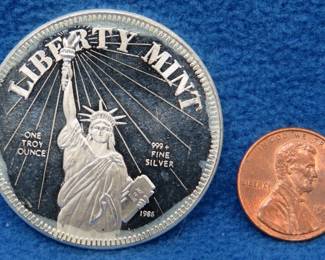 Lot 170. One troy ounce round of .999 silver from the Liberty Mint