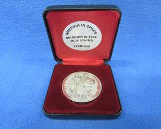 Lot 104. 1964 NASA America in Space sterling silver medallion depicting Mariner IV. 26.38 grams.