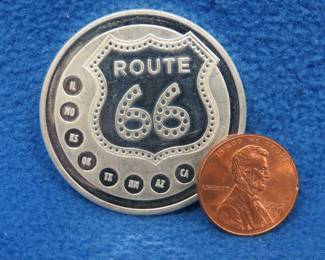 Lot 324. "Get Your Kicks on Route 66" silver round. One ounce of .999 fine silver.