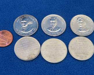 Lot 379. Six Franklin Mint First Edition Presidential Mini coins weighing a total of 46.5 grams.