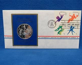 Lot 341. 1978 First Day of Issue cachet with a sterling silver proof medallion weighing approx. 25 grams.