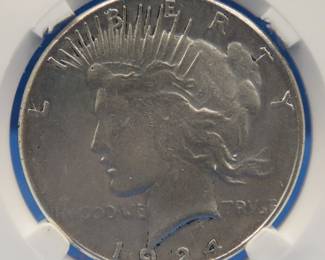 Lot 306. 1924 Peace Dollar