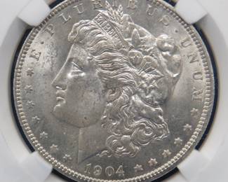 Lot 318. 1904 O Morgan silver dollar