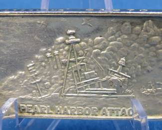 Lot 112. Pearl Harbor commemorative sterling silver ingot weighing 44 grams