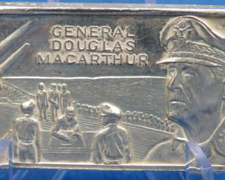 Lot 117. General Douglas McCarthur commemorative sterling silver ingot weighing 45 grams
