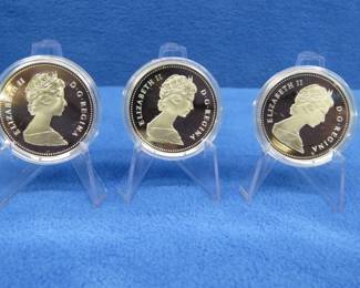 Lot 260. Three 1984 Canadian Proof Silver Dollar each coin has 11.5 grams of fine silver