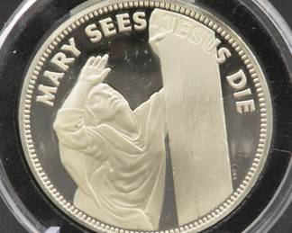 Lot 375. Mary sees Jesus Die silver round weighing 26.65 grams