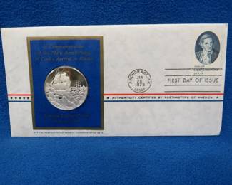 Lot 344. 1978 First Day of Issue cachet with a sterling silver proof medallion weighing approx. 25 grams.