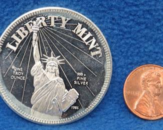Lot 179. One troy ounce round of .999 silver from the Liberty Mint