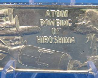 Lot 113. Atom Bombing of Hiroshima commemorative sterling silver ingot weighing 44 grams