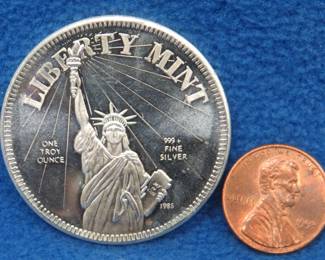 Lot 178. One troy ounce round of .999 silver from the Liberty Mint
