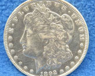 Lot 400. 1892 O Morgan silver dollar