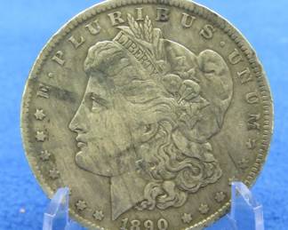 Lot 17. 1890 O Morgan Silver Dollar